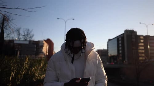 african american man smartphone city