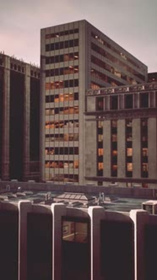 Building Reflections at Dusk in an Urban Landscape with Glowing Windows