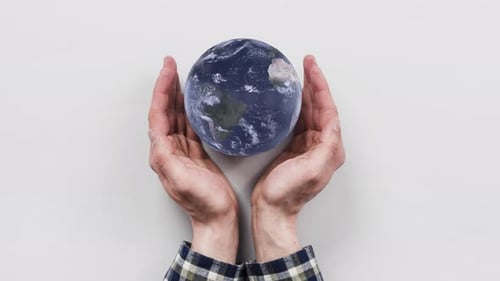 Earth Globe In Hand Background 4k Loop