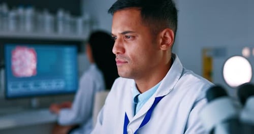 Scientist Thinking in Modern Medical Lab