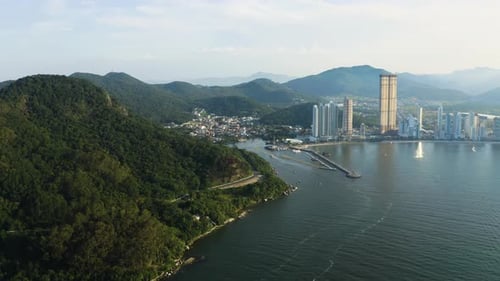 Drone view approaching Balneario Camboriu, Santa Catarina, Brazil at sunset