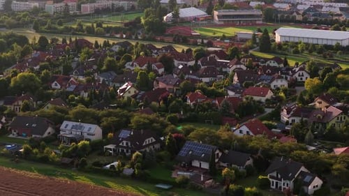 Aerial view of a residential district in summer. Apartment buildings and family houses. City view