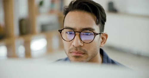 Computer, glasses and businessman at desk with email, online article or professional thinking