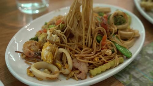 Delicious Chow Mein Noodles with Squid and Vegetables