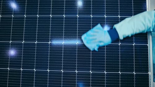 Solar panel manufacturing factory.
Factory Worker Wipes The Solar Panel. 4K
