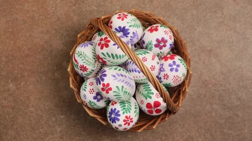 Easter eggs in the basket rotation. Happy Easter holiday concept background