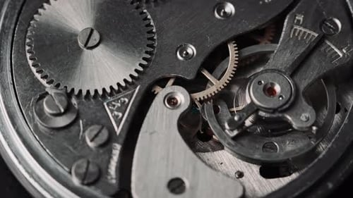 Rotating Gears Inside a Watch Mechanism Close Up