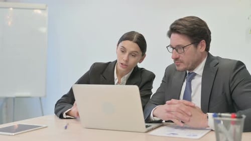 Online Video Chat by Business People in Office