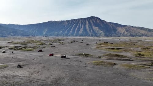 Off-Road Vehicles Exploring a Desert Mountain Landscape