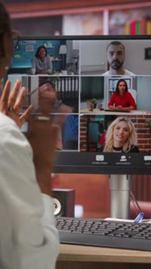 Adult in Virtual Meeting on Computer Screen
