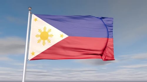 Waving Flag of the Philippines Against a Blue Sky