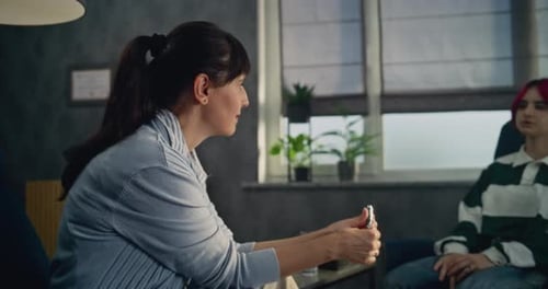 Female Psychologist Listens to Teen Girl Provides Counseling Session