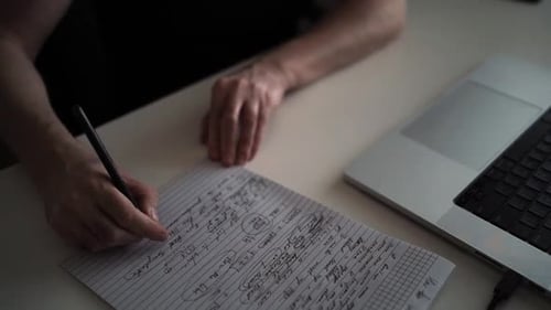 Creative Journaling: Man Working from Home Office