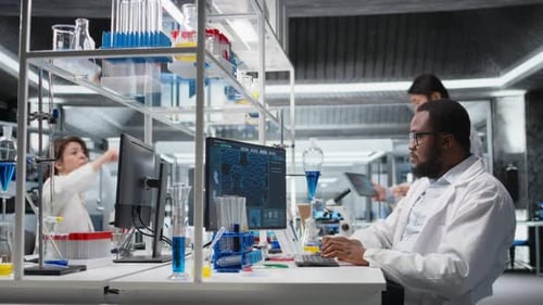 Scientists Working in Modern Medical Research Laboratory