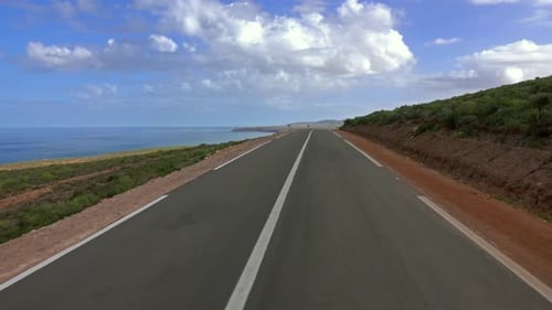 View From Car Driving on Road Along Atlantic Coast