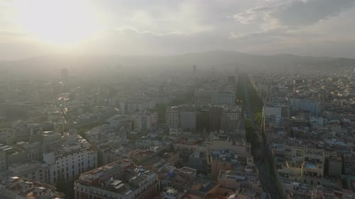 Aerial Slide and Pan Footage of Buildings in Residential Urban Neighbourhood Hazy View Against