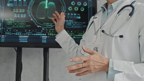 Medical Doctor Explains Lung Data on Monitor