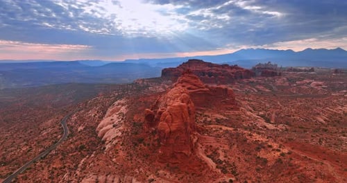 Approaching rounded orange rocks in the Arches National Park in Utah, USA.