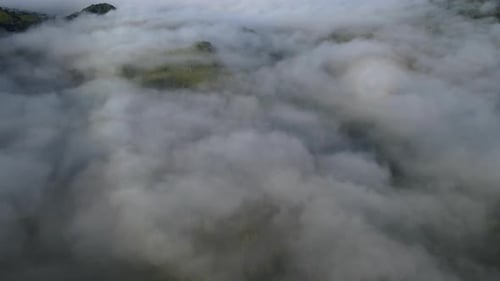 Aerial View of Foggy Mountainous Landscape