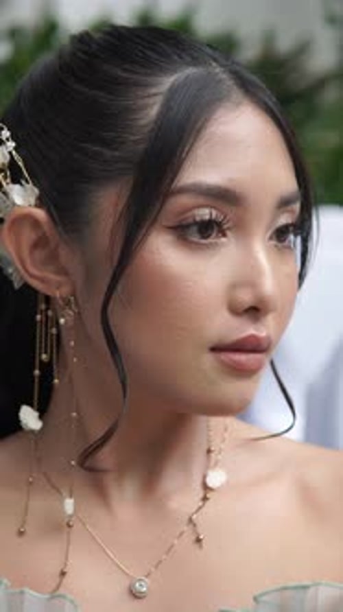 Elegant Woman Wearing Jewelry in Close Up