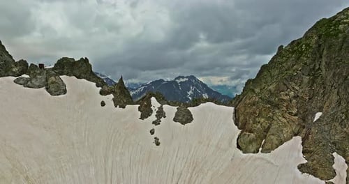 Ancient Snow Glacier Among High Mountains The Peaks of the Mountains are Covered with Snow