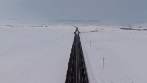 Aerial view of an intercity road in winter