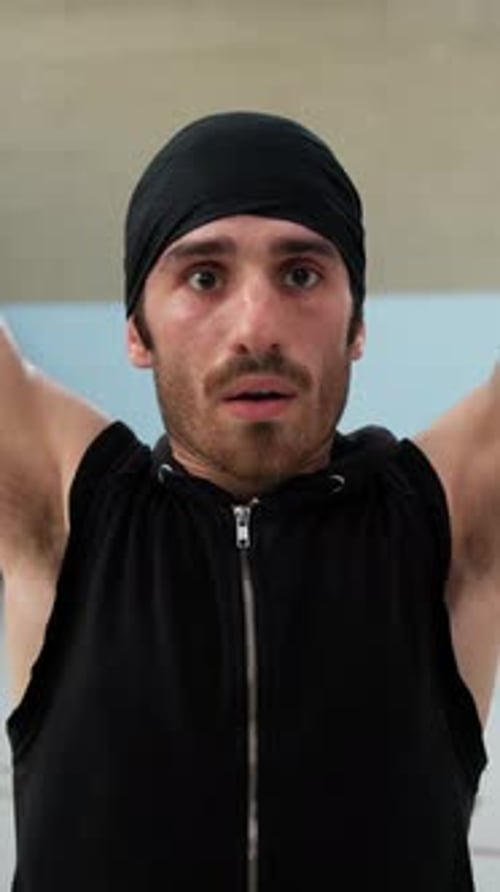 Athlete Moves Arms Biceps After Warming Up Basketball Court