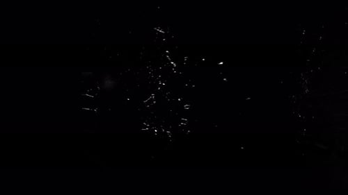 Fragment Collection: Glass shattering on a black background with two big bullet holes effect