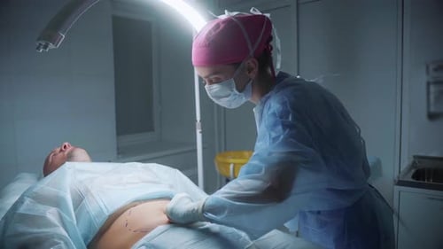 Doctor Performing Surgery in Operating Room