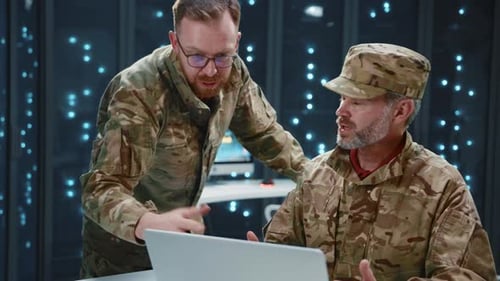 In Data Center Security Office Two Military Soldiers Using Computer Webhosting and Cloud Computing