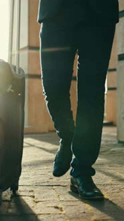 Feet, business man and suitcase in street for travel, airport or immigration with walk