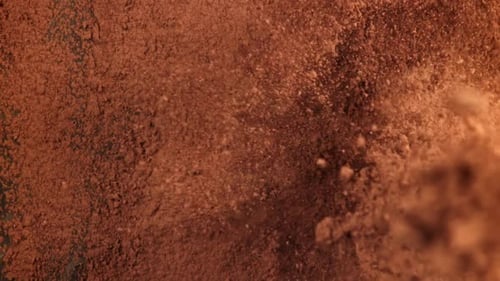 Cocoa Powder Falls on the Table Filmed on a Highspeed Camera at 1000 Fps