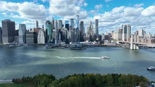 Manhattan Skyline In New York City With A View Of Skyscrapers Along The Hudson River. Aerial Slow