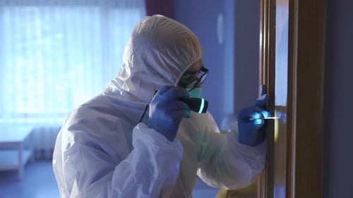 Scientist Collects Sample Swab from Wooden Door Frame