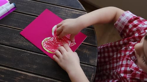 Child Making a Homemade Valentine's Day Card