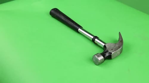 hammer turning on green screen