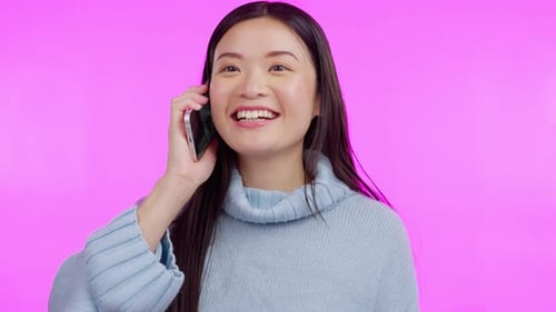 Asian woman, phone call and happy for talking in studio for communication