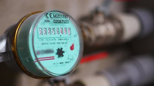 Close Up of Blue and Silver Water Meter