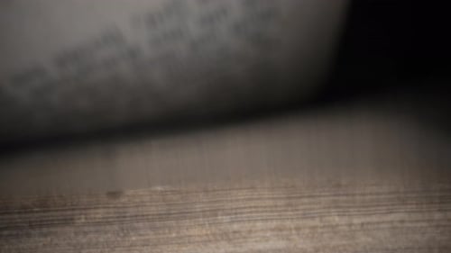 Macro View of Flipping Pages of Antique Book Bible Looking for Information From Old Archival