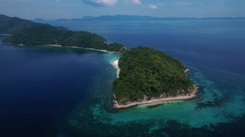 Drone Aerial Shot of Exotic Island Surrounded by Turquoise Waters in Palawan, Philippines
