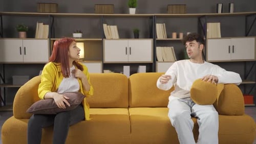 Married couple arguing at home.