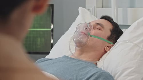Woman Visiting Her Husband in Coma at Hospital
