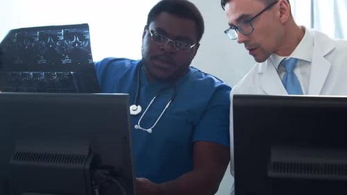 Doctor and Surgeon Talking Near Window Medical Workers in Hospital Office Day Light Healthcare