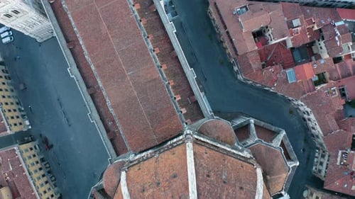 Top Down Birds Eye View of Florence Duomo from Above. Beautiful Colorful Roof. Filmed at Sunrise