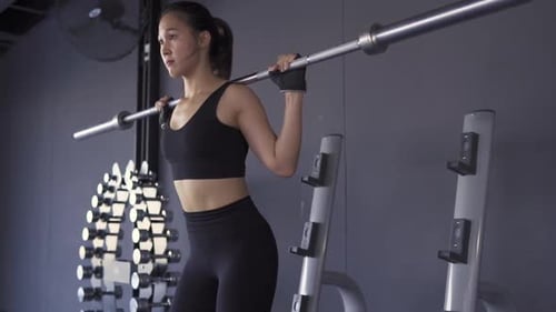 Sporty Asian Woman Exercise Training Building Muscles and Burning Fat Cardio