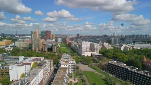 In the background Potsdamer Platz TV tower welt balloon.
Wonderful aerial view flight panorama orbit