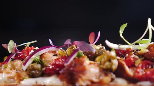 Rotating Dish Delicious Bruschetta with Ricotta Cheese and Herbs