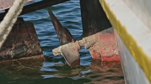 Propeller of a Fishing Boat at Sea