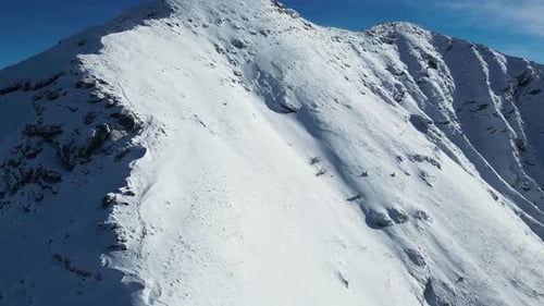 Amazing view of different mountain peaks with snow during winter. Beautiful mountain range