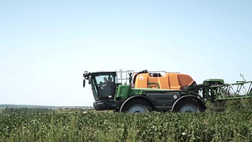 Spray Fertilize On Field With Chemicals In Agriculture Field